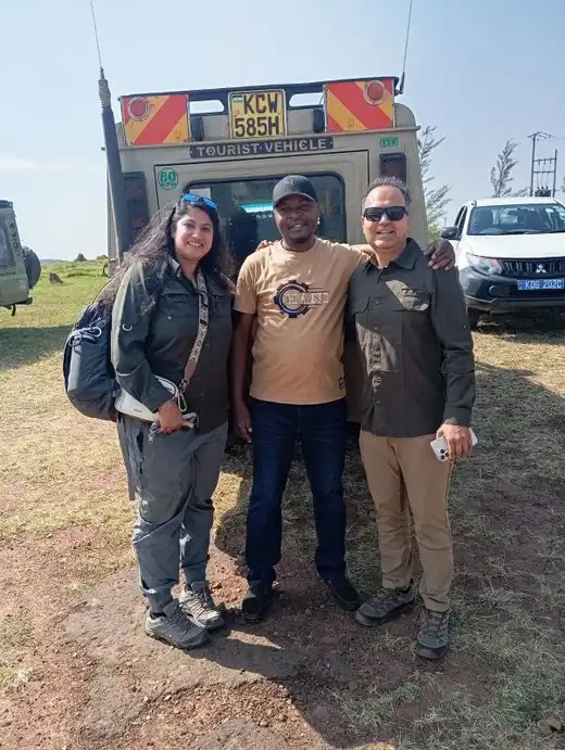 Kenya safari packages with a 4x4 Land Cruiser on a wildlife game drive in the Maasai Mara National Reserve